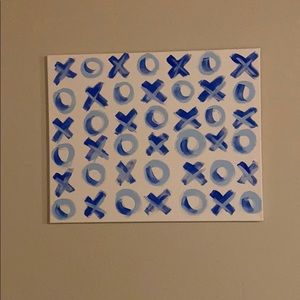X and O painting in blue and light blue 36’’24’’
